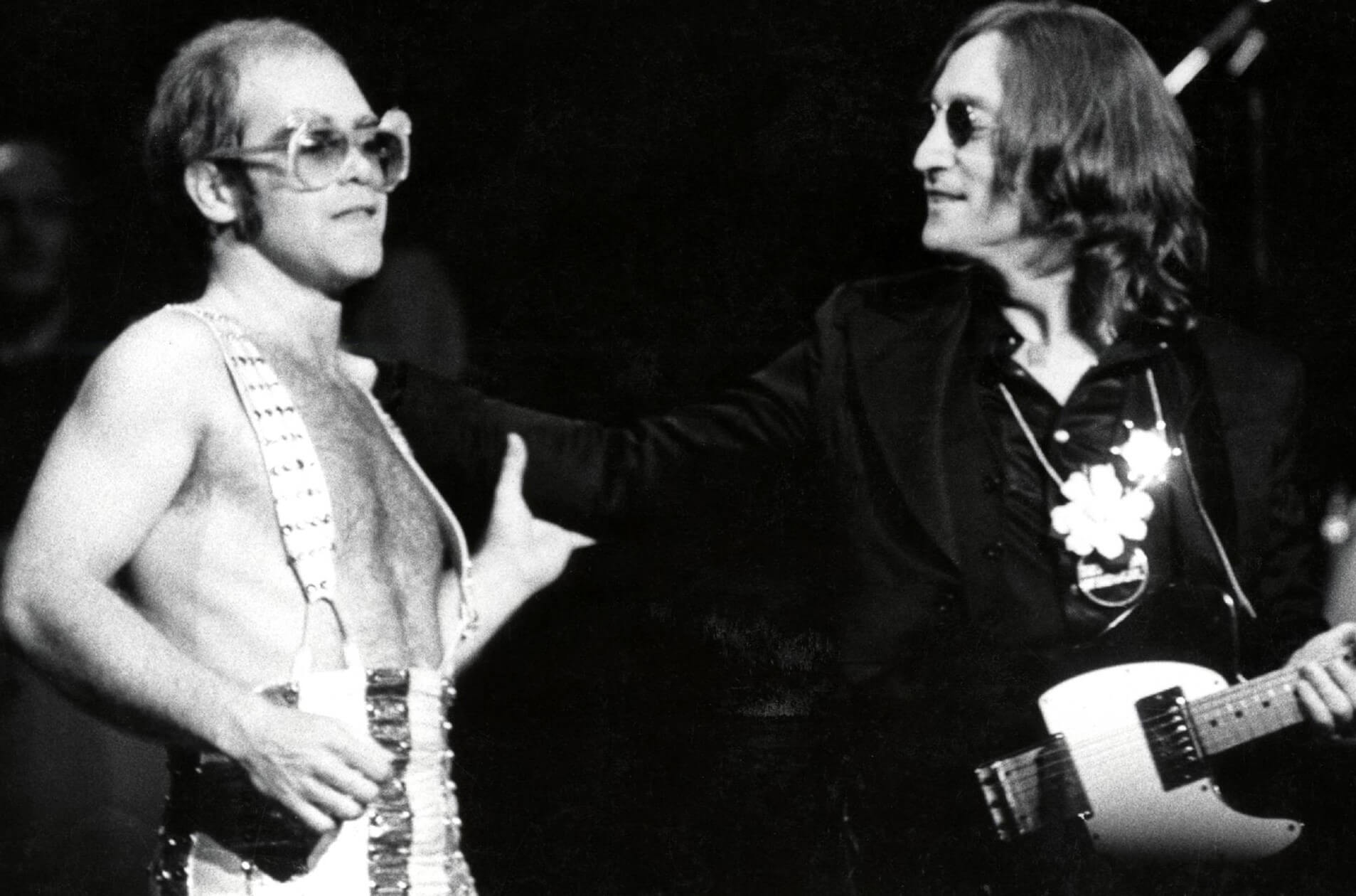 Elton John and John Lennon in black-and-white
