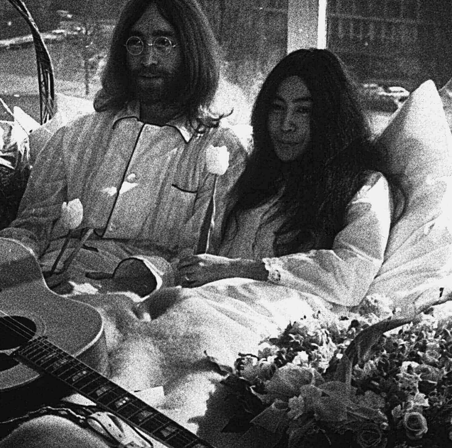 John Lennon and Yoko Ono in bed