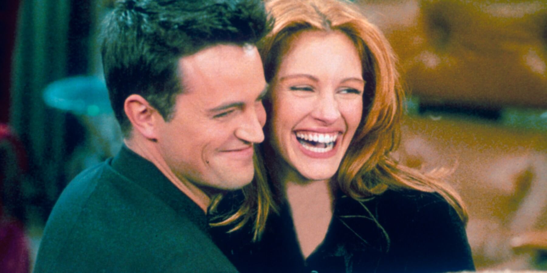 Matthew Perry and Julia Roberts on the set of 'Friends' in the 1996 episode titled "The One After the Superbowl."