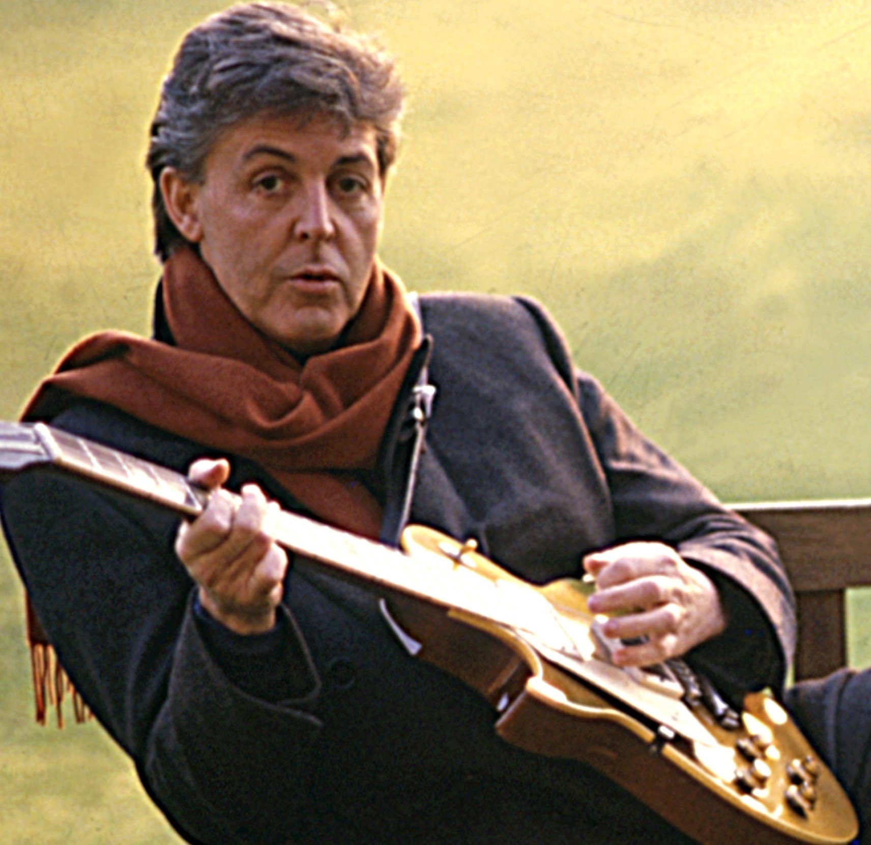 Paul McCartney wearing a scarf