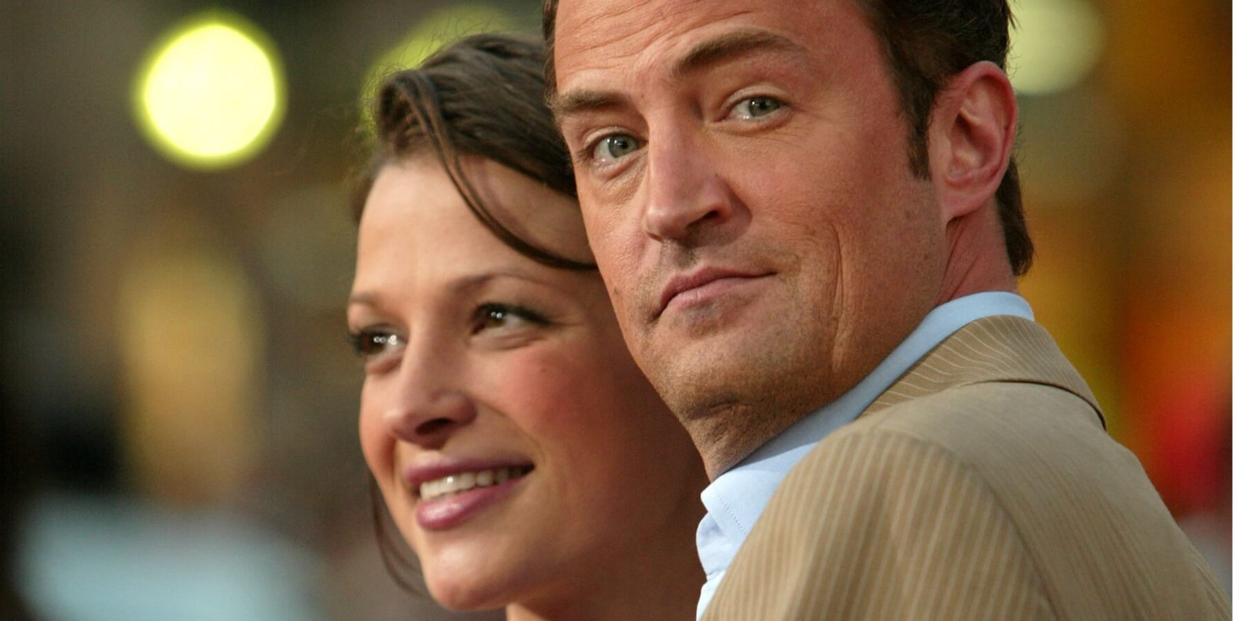 Rachel Dunn and Matthew Perry at a movie premiere.