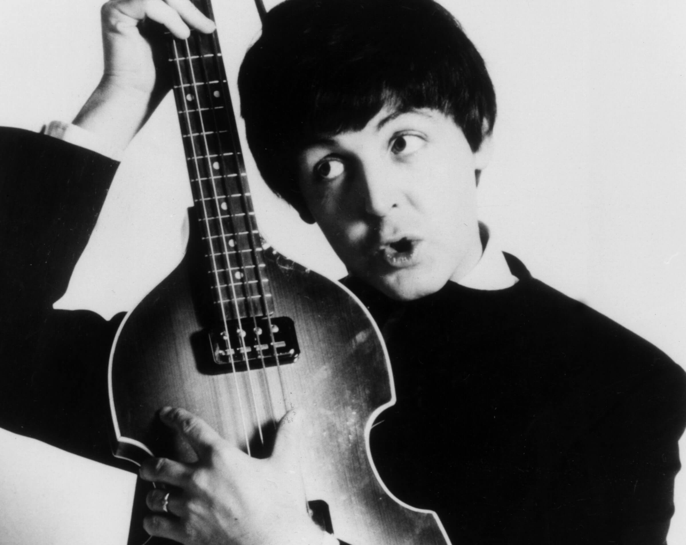 The Beatles' Paul McCartney with an instrument