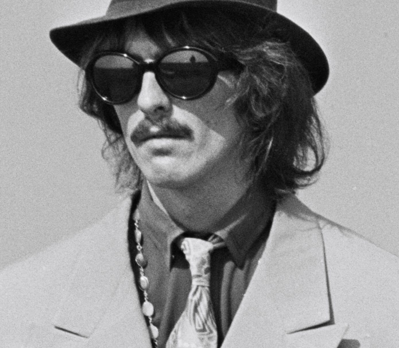 The Beatles' George Harrison wearing a hat