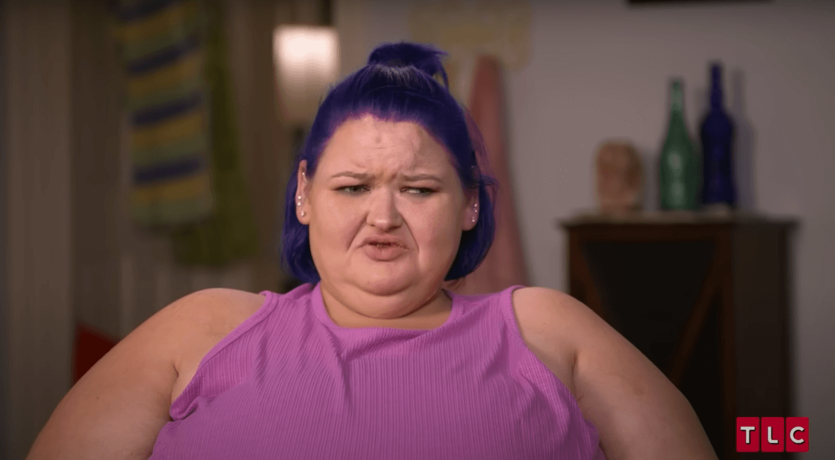 Amy Slaton with purple hair and a pink top in '1000-lb Sisters'