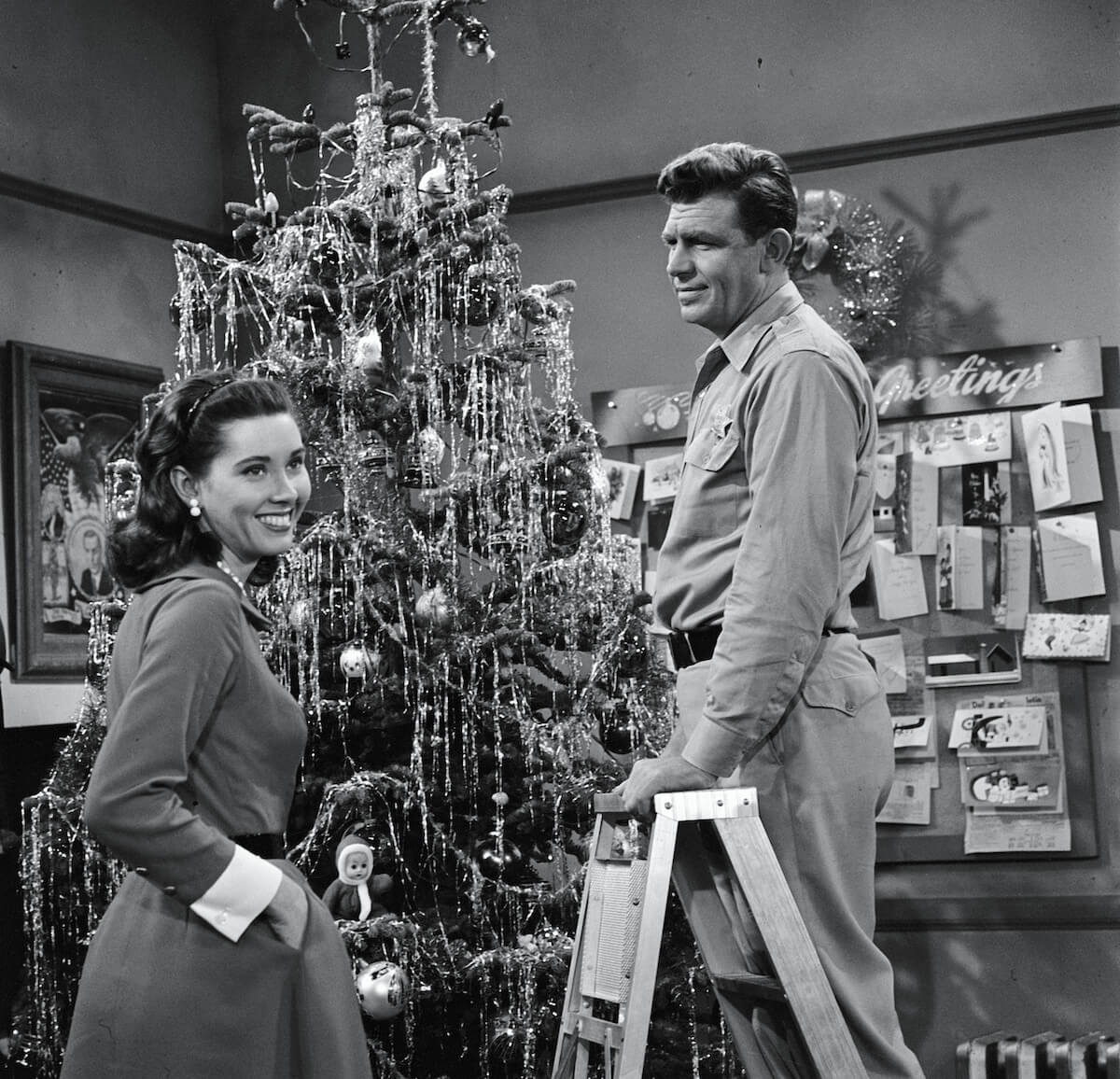 Andy and Ellie decorating a Christmas tree in 'The Andy Griffith Show'