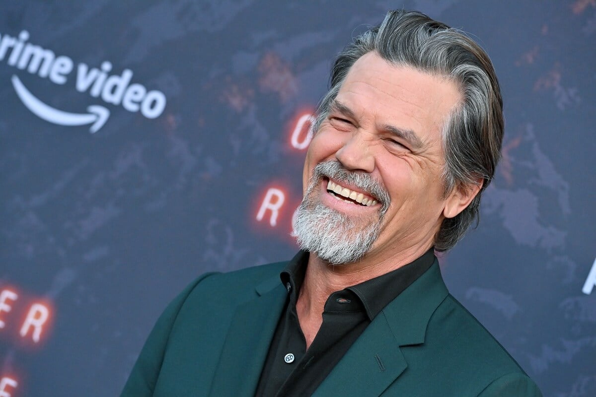 Josh Brolin smiling in a suit at the Los Angeles premiere of Los Angeles Premiere of Prime Video's Western "Outer Range" at Harmony Gold.