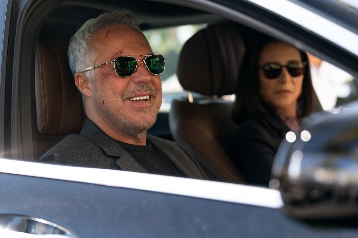 Harry and Honey in a car wearing sunglasses in 'Bosch: Legacy'