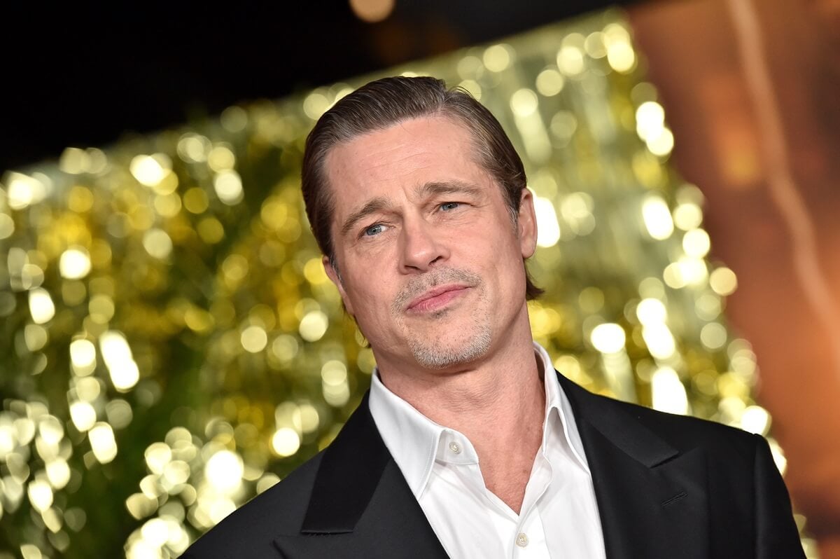Brad Pitt posing at the the "Babylon" Global Premiere Screening.