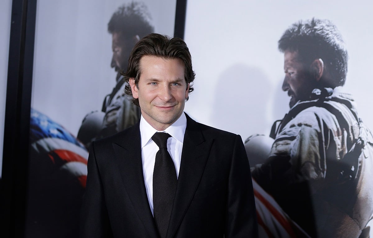 Bradley Cooper posing in a suit at the 'American Sniper' premiere in New York.
