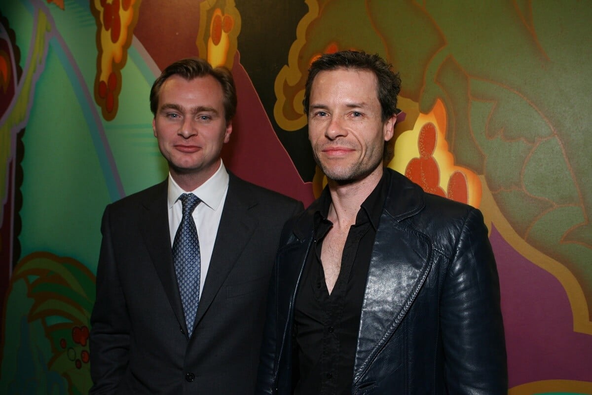 Christopher Nolan and Guy Pearce posing together at the premiere of 'The Prestige'.