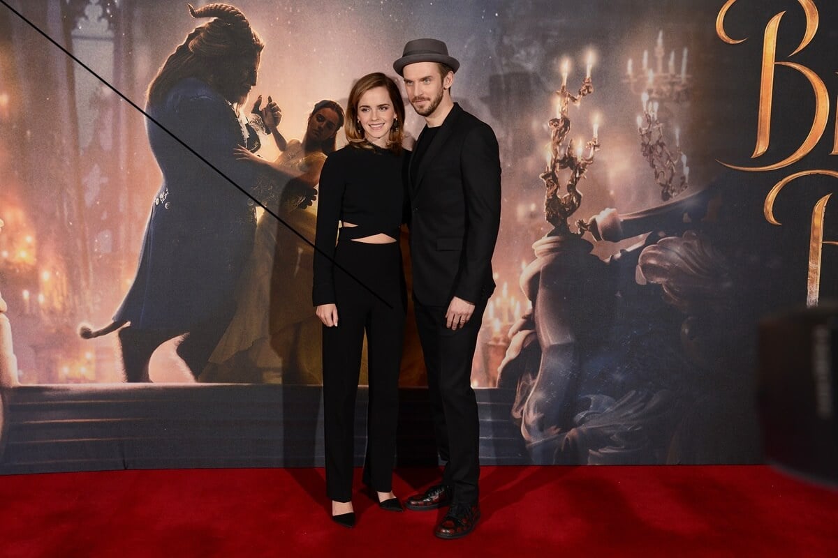 Emma Watson and Dan Stevens posing together at a photocall for 'Beauty and the Beast'.