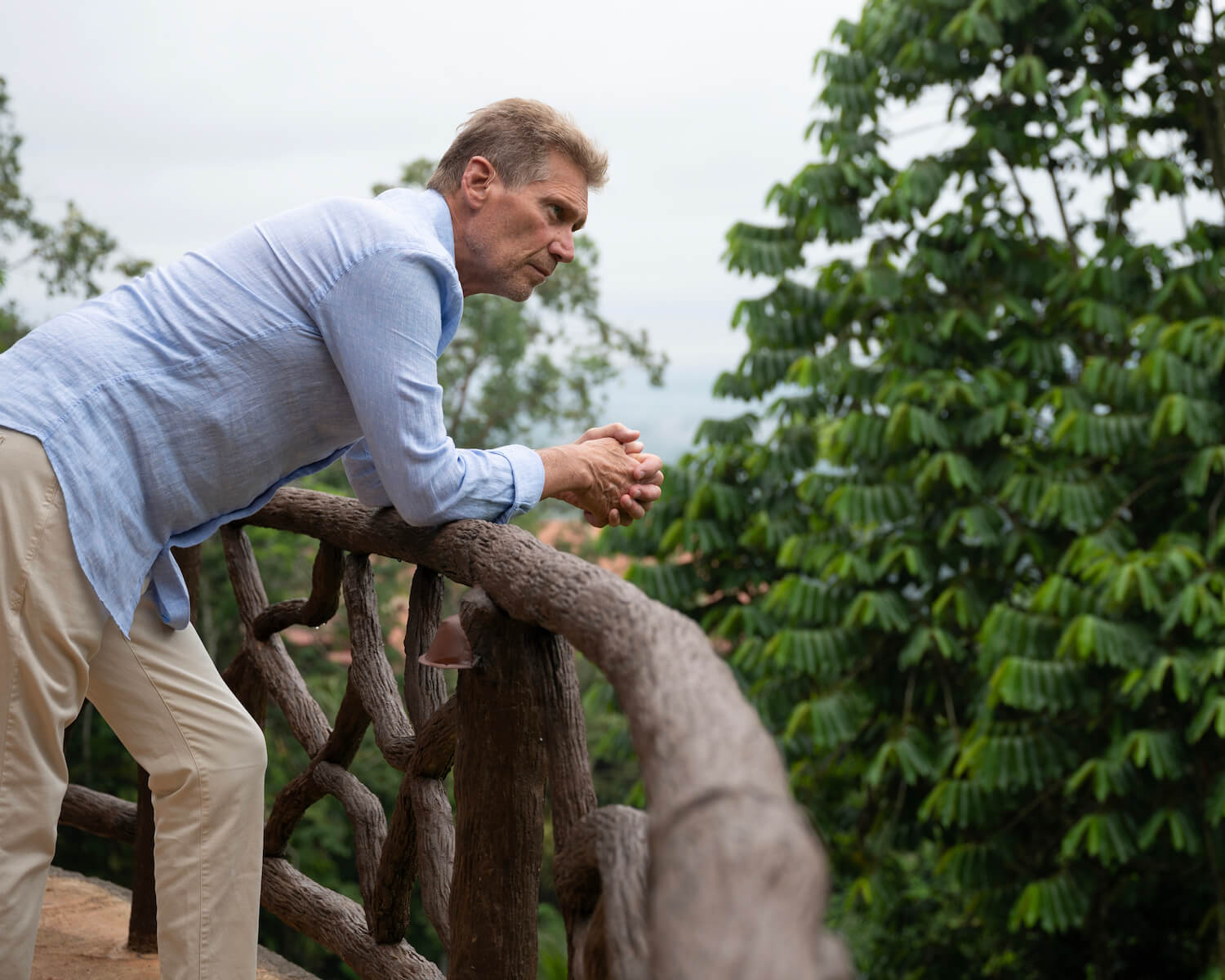 'The Golden Bachelor' star Gerry Turner leaning on a railing outside in Costa Rica during the finale