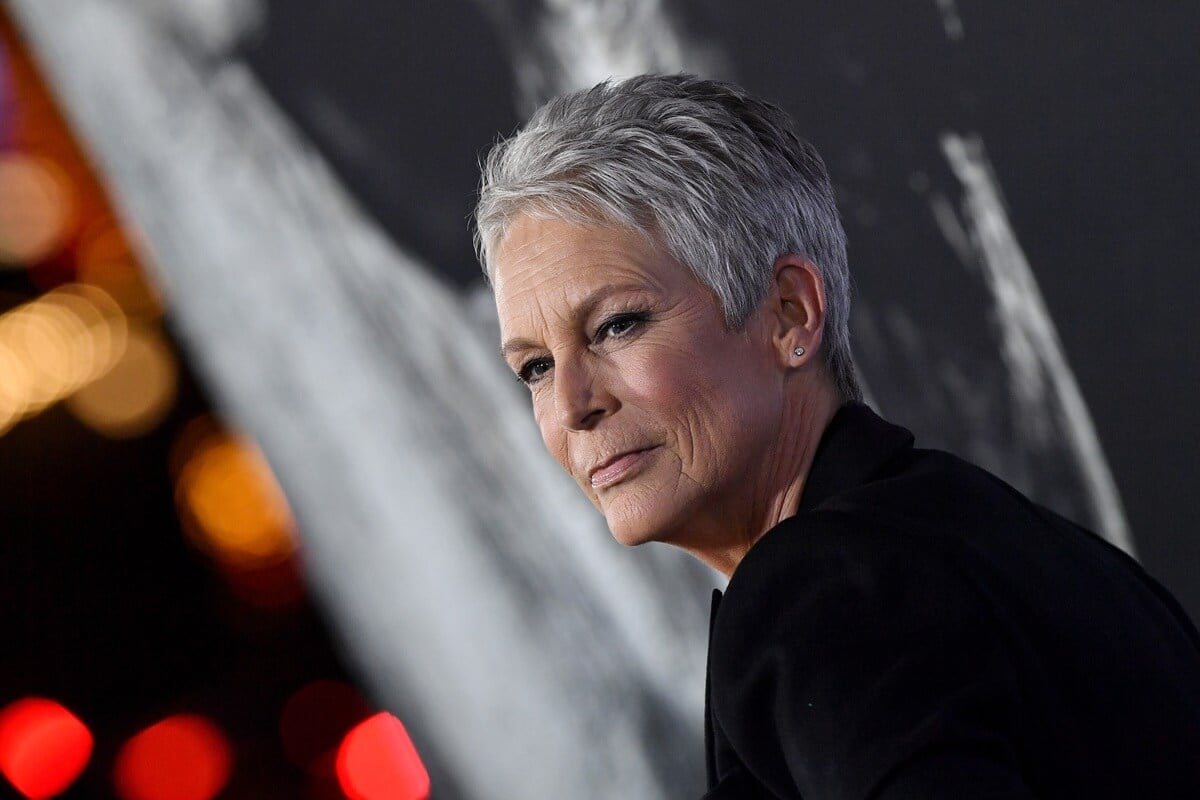 Jamie Lee Curtis posing in a black outfit at the premiere of 'Halloween'.