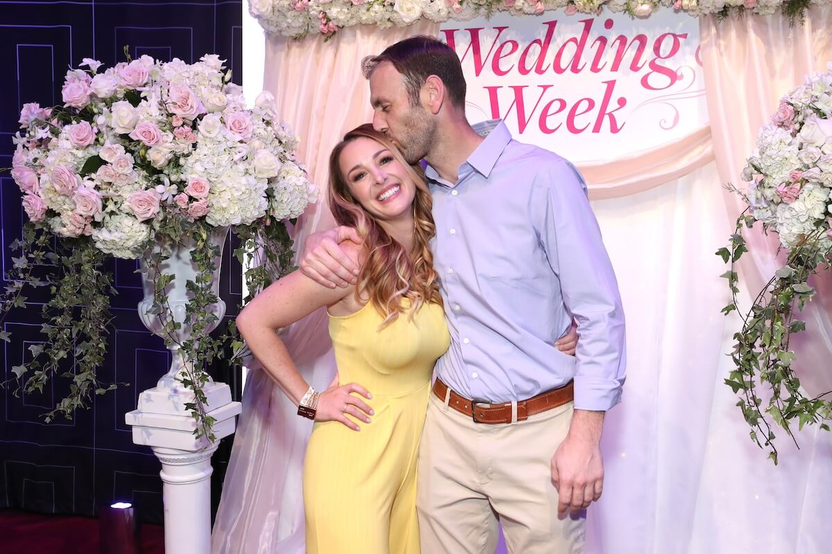 'Married at First Sight' Season 1 cast member Doug Hehner kissing wife Jamie Otis on forehead