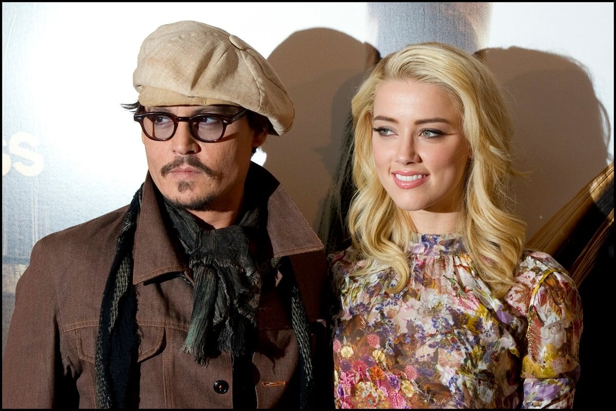 Johnny Depp and Amber Heard at a photocall for 'The Rum Diary'.