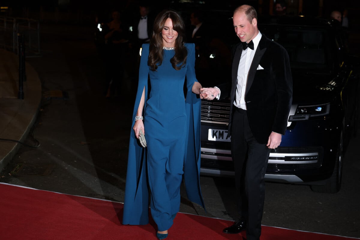Kate Middleton and Prince William, whose romance was 'orchestrated' by Carole Middleton, per Omid Scobie's 'Endgame,' walk the red carpet