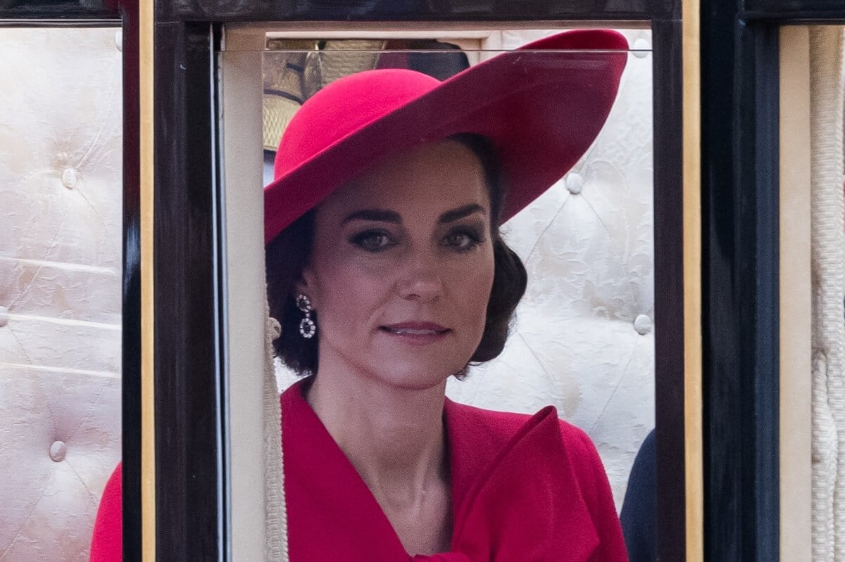 Kate Middleton travels in a carriage towards Buckingham Palace after the ceremonial welcome at Horse Guards Parade