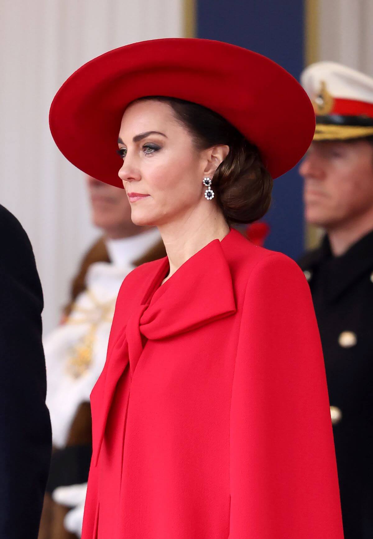 Kate Middleton wearing red during the ceremonial welcome for the president and first lady of the Republic of Korea