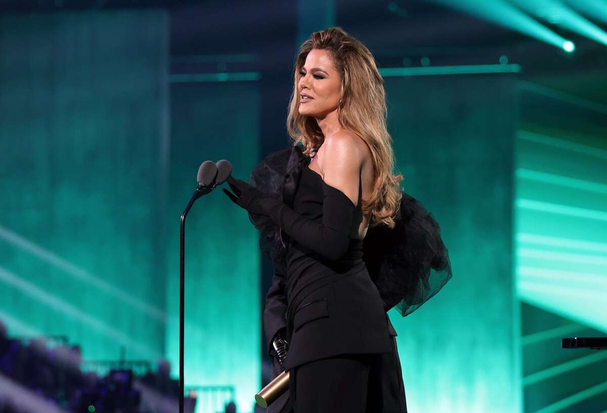 Khloé Kardashian, who has dealt with rumors about the identiy of her biological father, appears at the 2022 People's Choice Awards