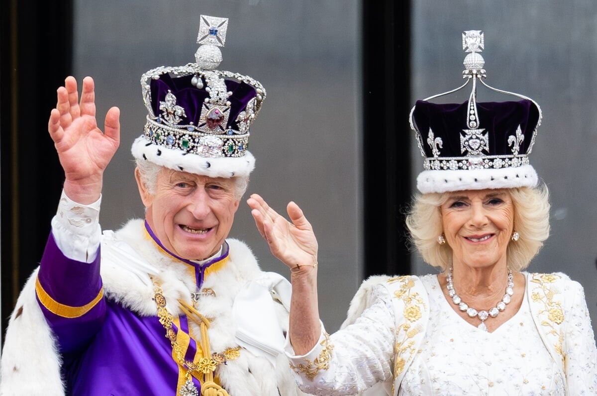 King Charles III and Queen Camilla (formerly Camilla Parker Bowles) appear on the balcony of Buckingham Palace following their coronation