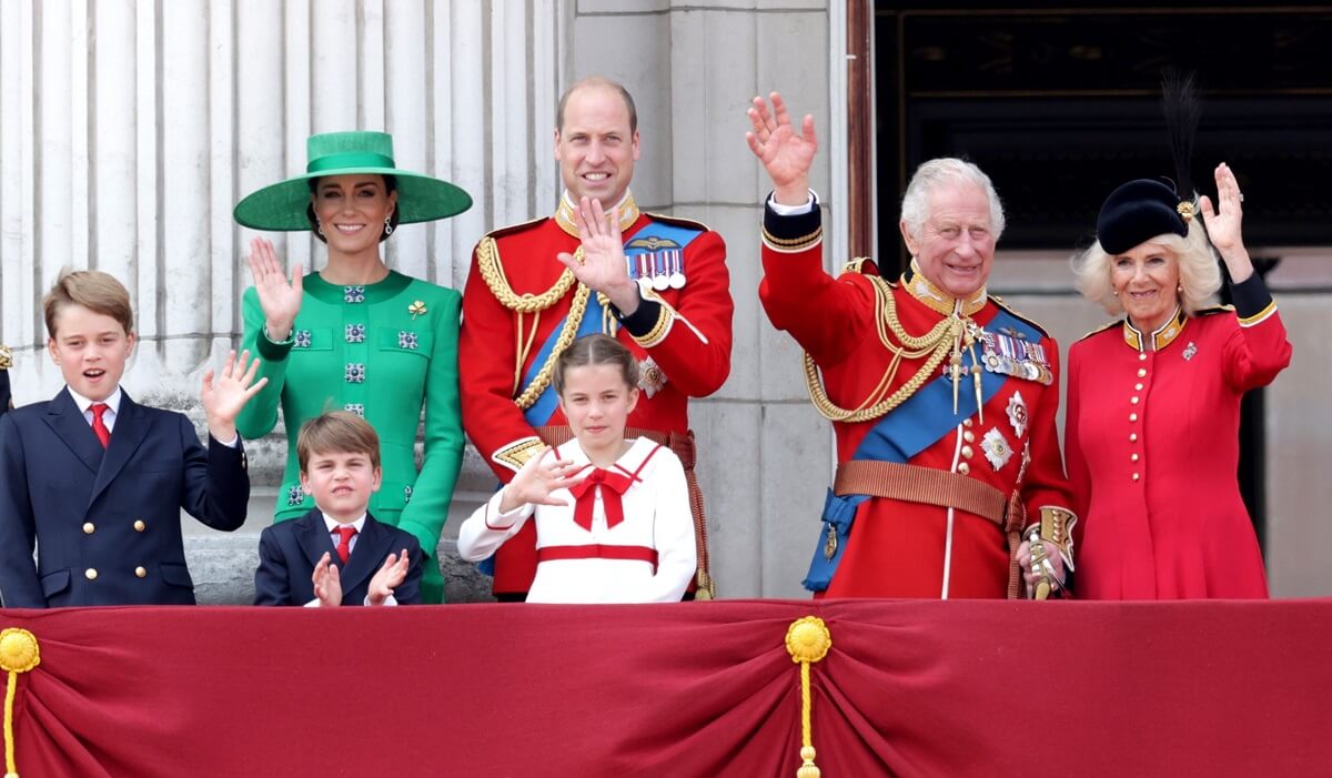 King Charles III and other members of the royal family watch a flypast from the balcony of Buckingham Palace during Trooping the Colour