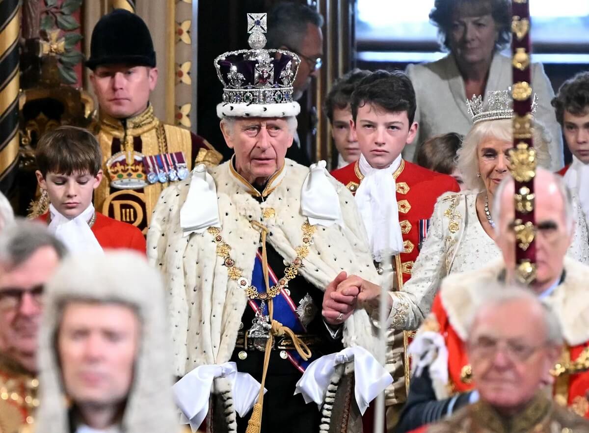 King Charles III, who's new bodyguard Princess Anne reminds him of his mother, wearing the Imperial State Crown and the Robe of State during the State Opening of Parliament in the House of Lords in London