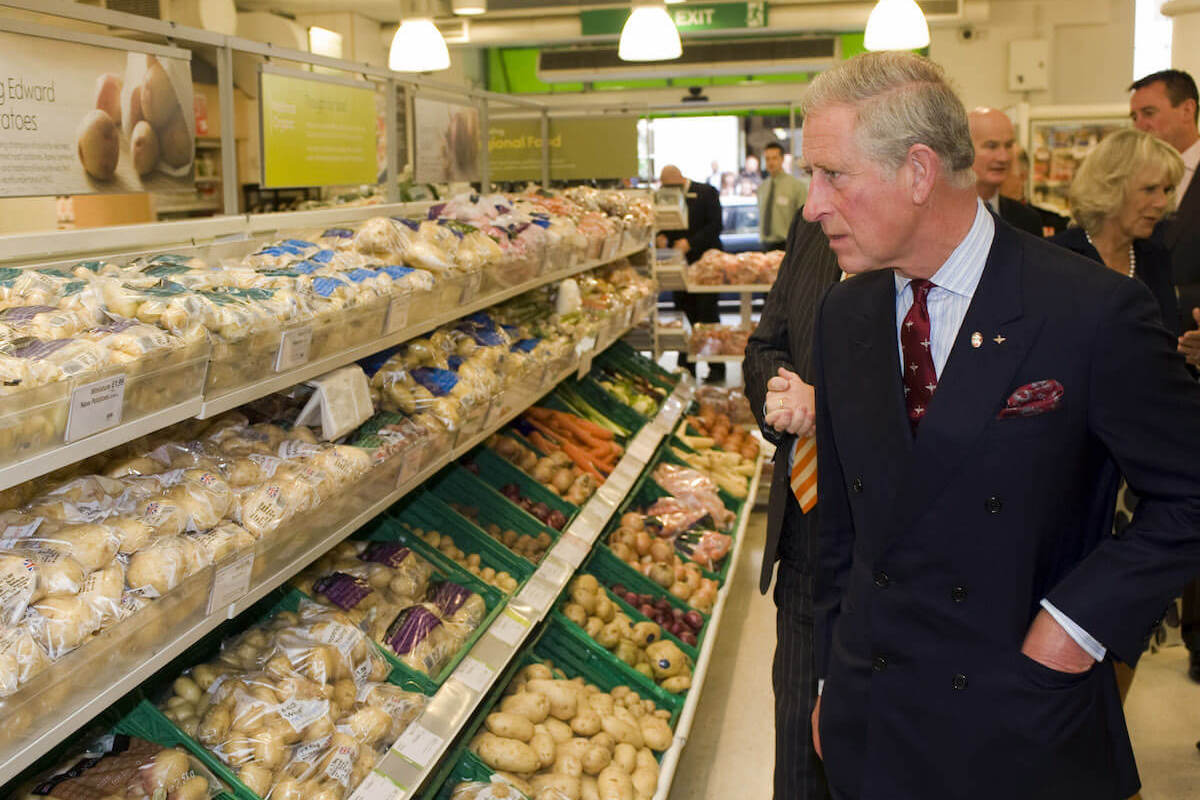 King Charles examines Duchy Originals products in a Waitrose store