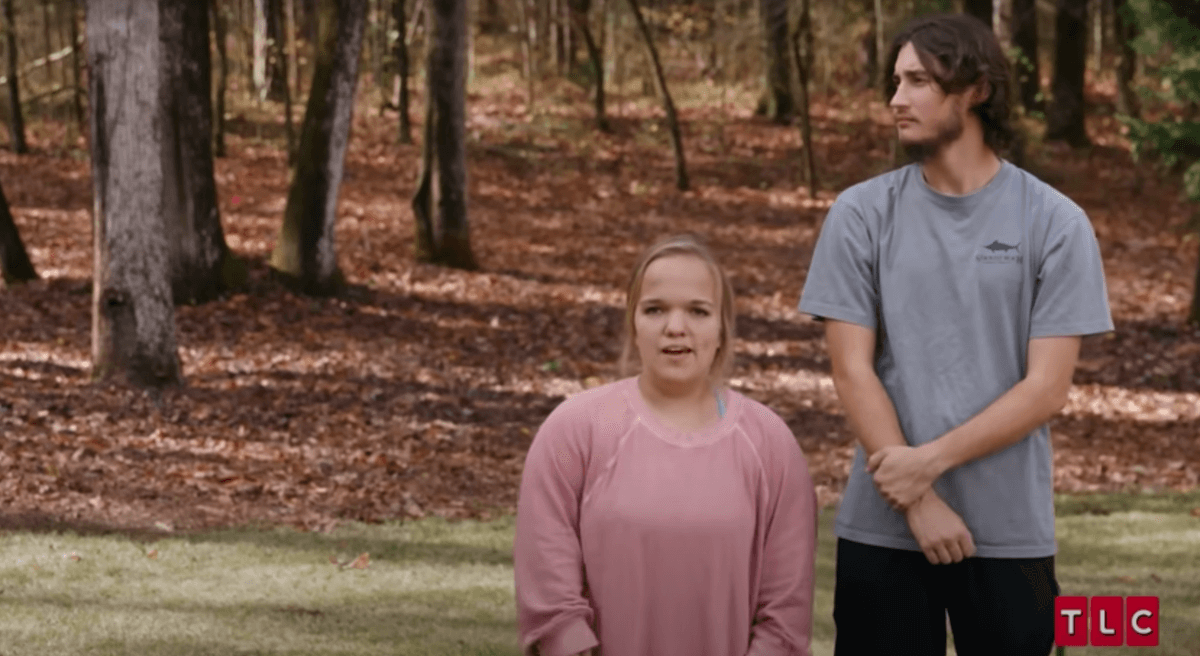 Liz Johnston and Brice Bolden of '7 Little Johnstons' standing in front of trees