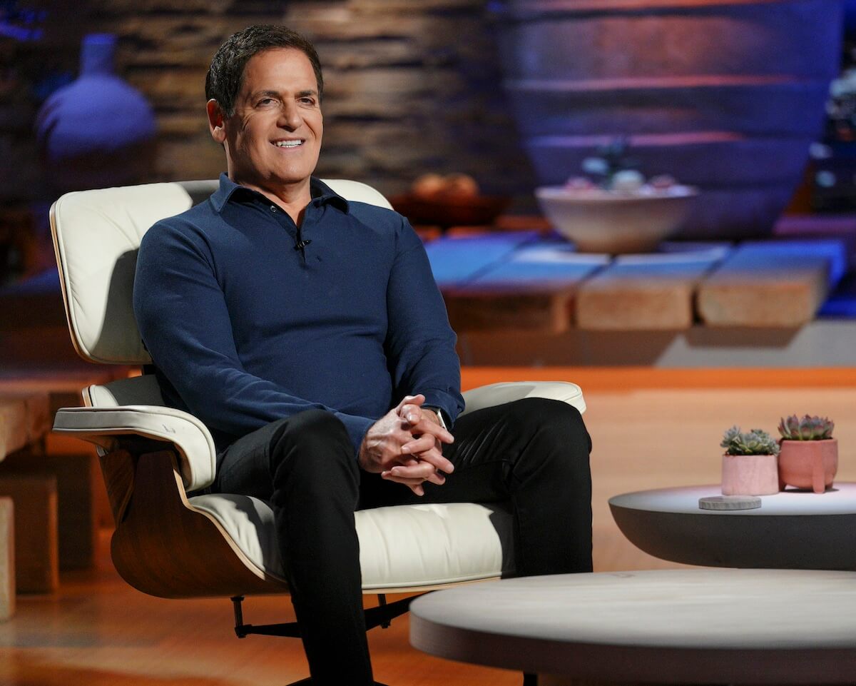 Mark Cuban sitting in a chair on the set of 'Shark Tank'