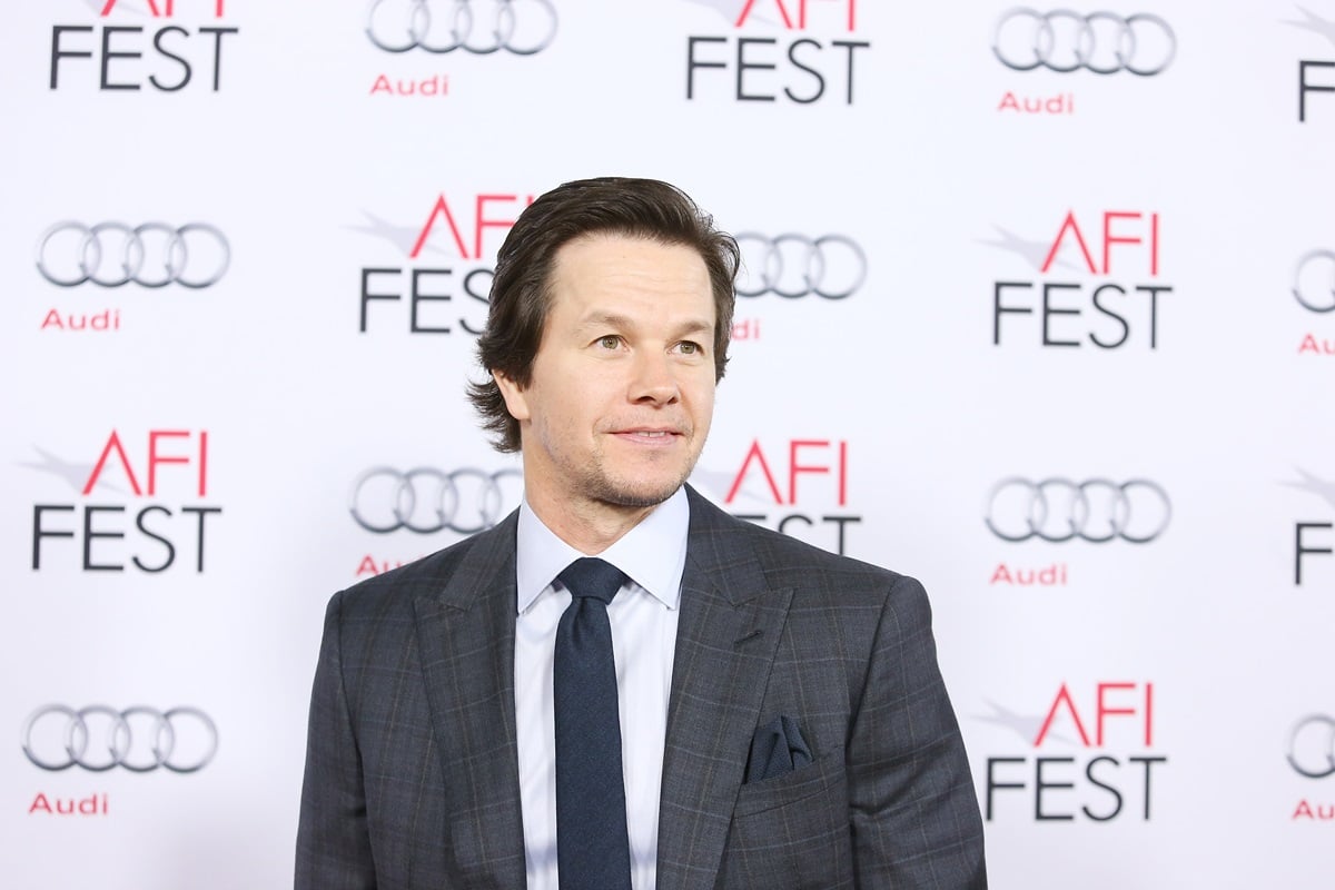 Mark Wahlberg at the AFI premiere of 'The Gambler', posing in a suit.