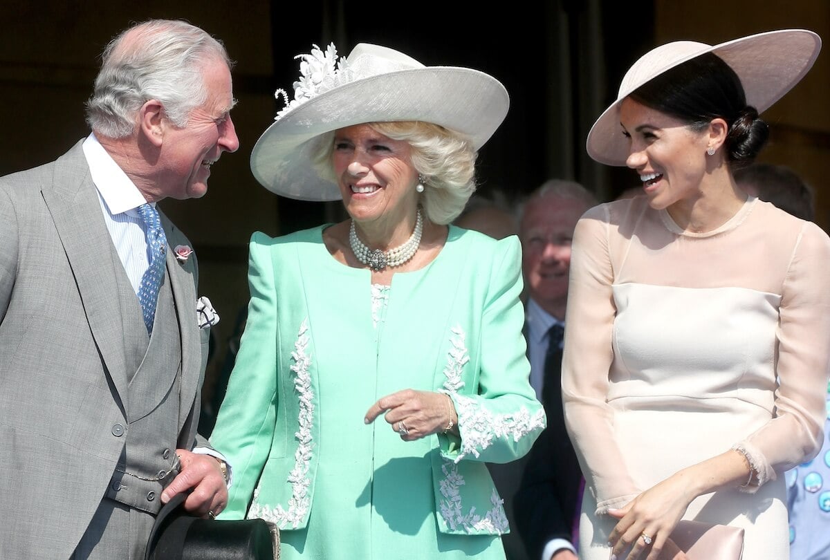 King Charles, Camilla Parker Bowles, and Meghan Markle