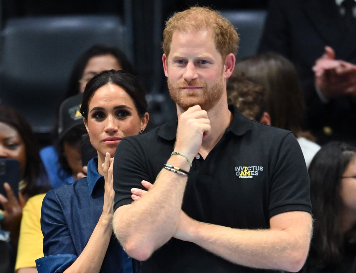 Meghan Markle, who a body language expert says recognized Prince Harry's a 'powerful person' at NHL game, attend the sitting volleyball final during Invictus Games Düsseldorf 2023
