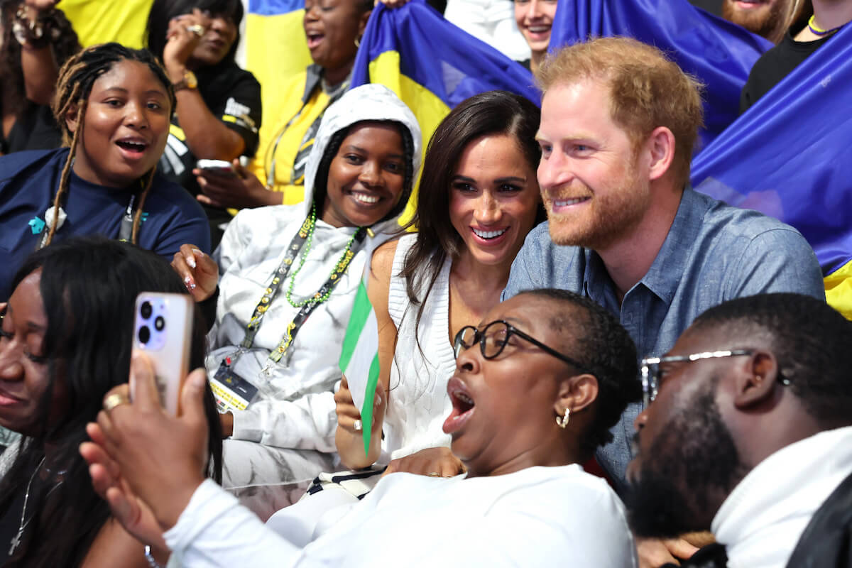 Meghan Markle, whose @Meghan Instagram account is a 'contingency,' poses for a selfie with Prince Harry