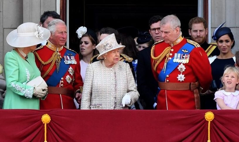 Members of the royal family including Prince Harry and Meghan Markle stand on the balcony of Buckingham Palace following Trooping the Colour