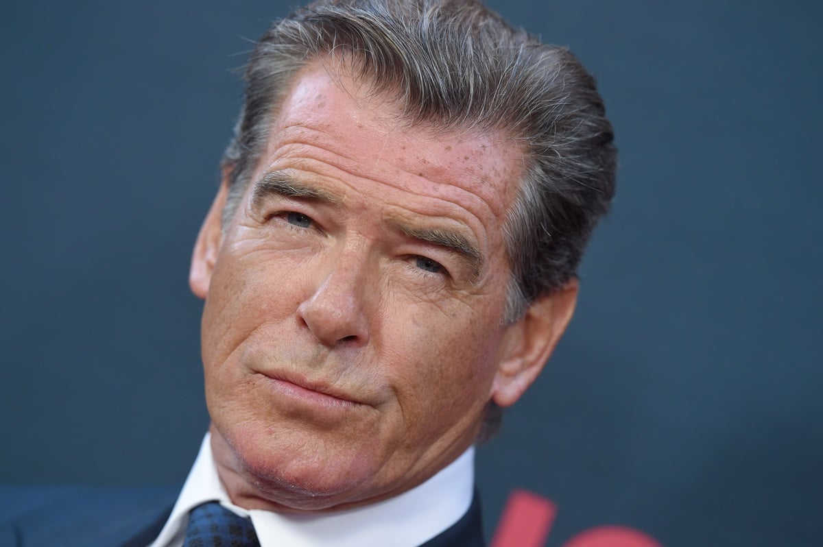 Pierce Brosnan arriving at the premiere of The Weinstein Company's 'No Escape' in a suit.