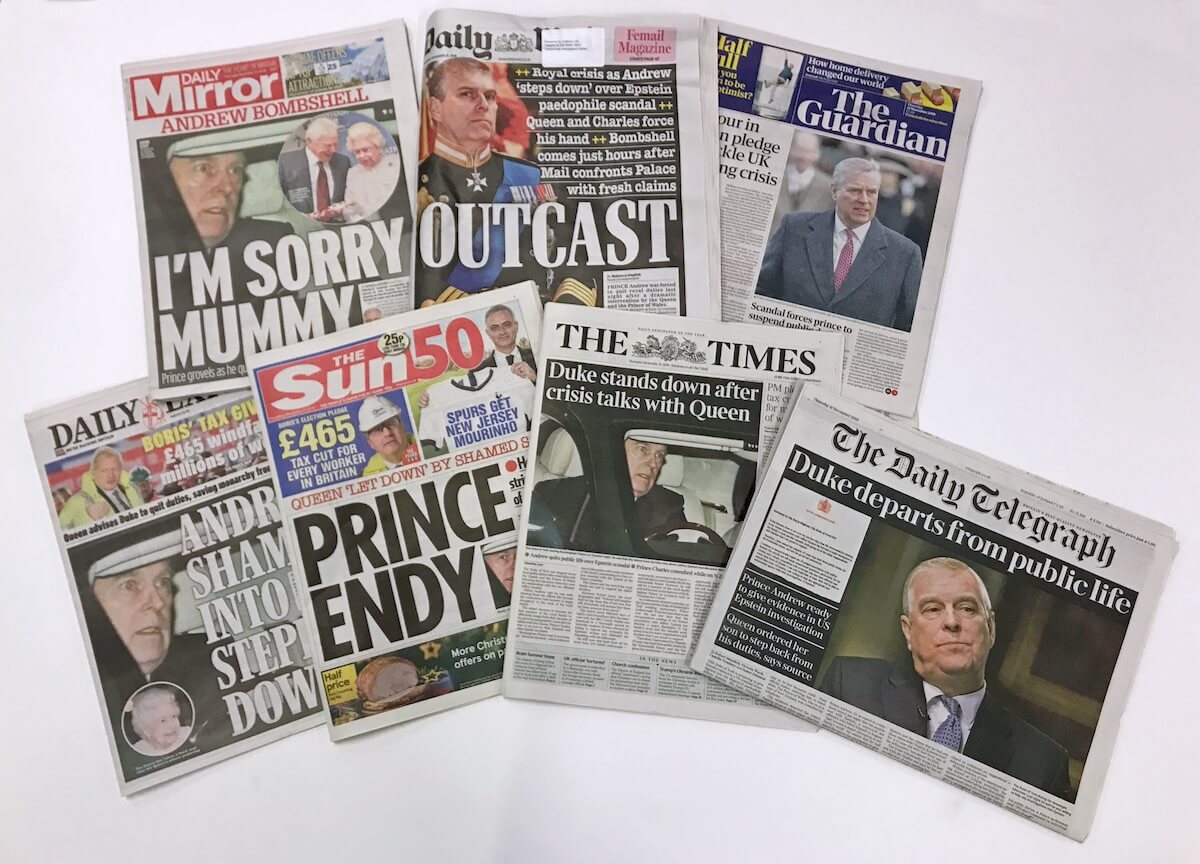 Collection of British newspapers with headlines about Prince Andrew stepping down from royal duties