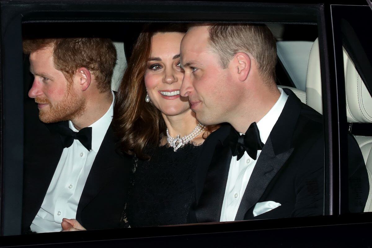 Prince Harry, Kate Middleton, Prince William in the back of a car before arriving at Windsor Castle