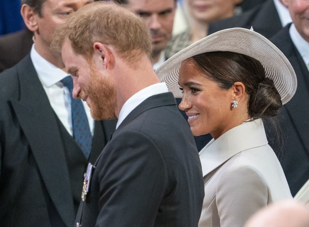Prince Harry and Meghan Markle, who shared a laugh and joke in church which a lip reader decoded, arrive at the service of thanksgiving for Queen Elizabeth's Platinum Jubilee