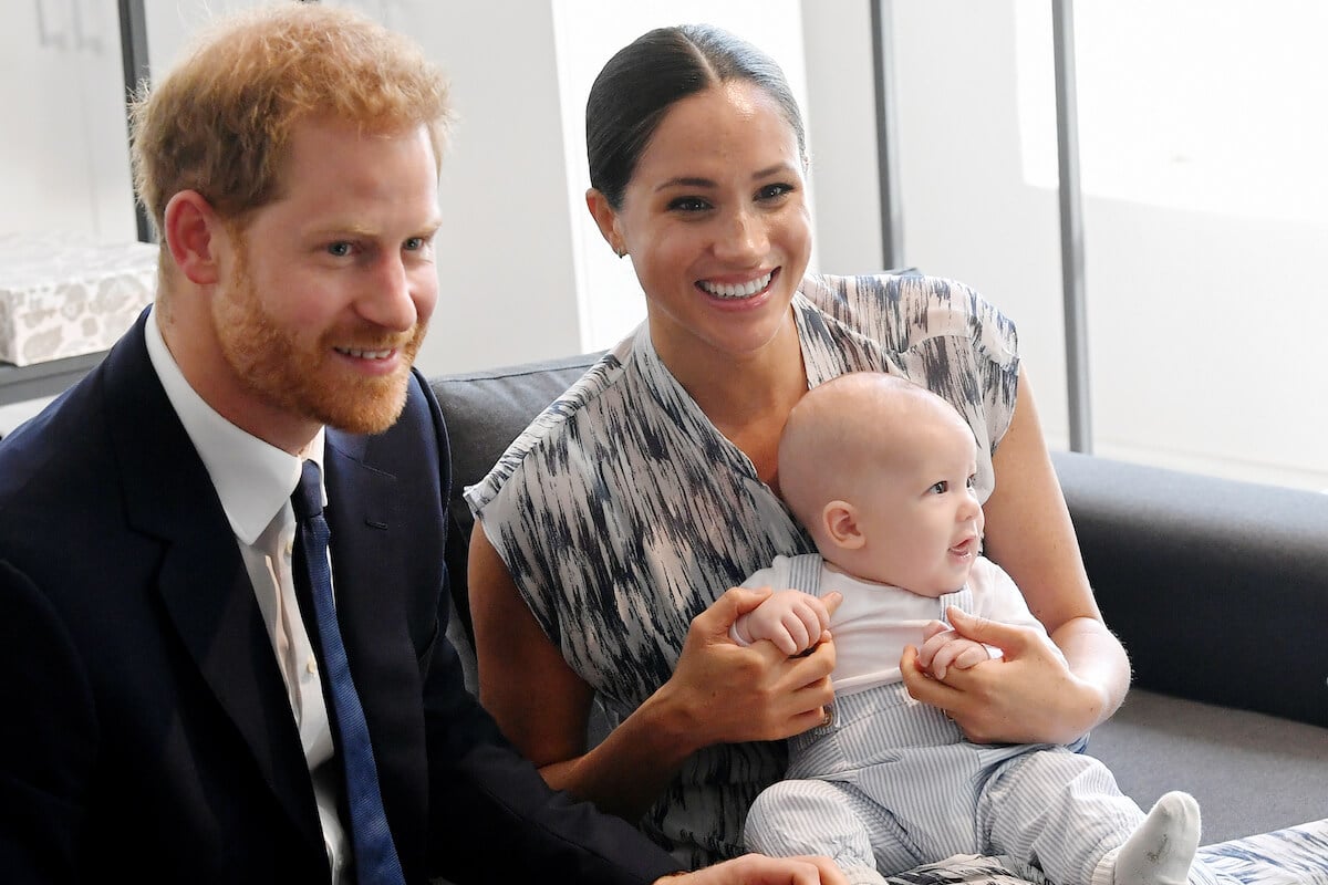 Prince Harry and Meghan Markle sit with their son, Prince Archie, who will have to ask permission to marry as sixth in the line of succession
