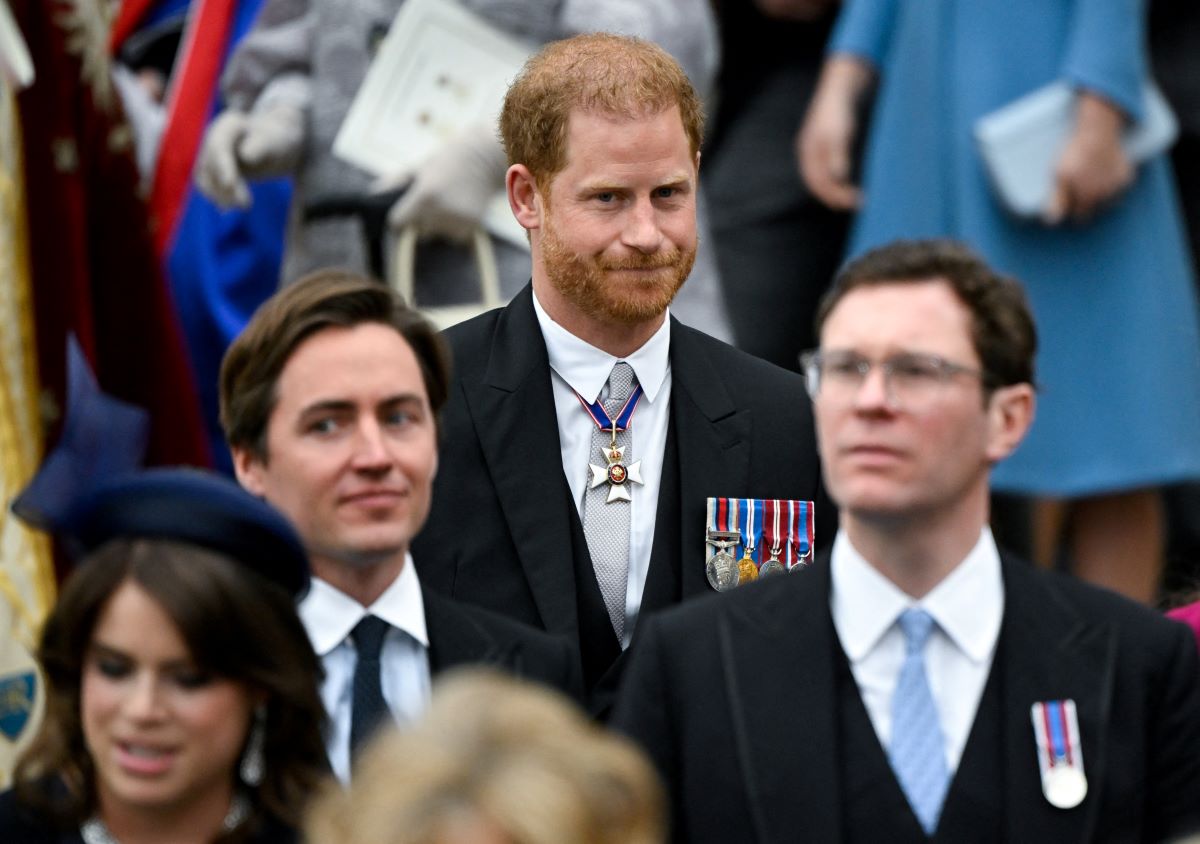 Prince Harry leaves Westminster Abbey following the Coronation of King Charles III and Queen Camilla