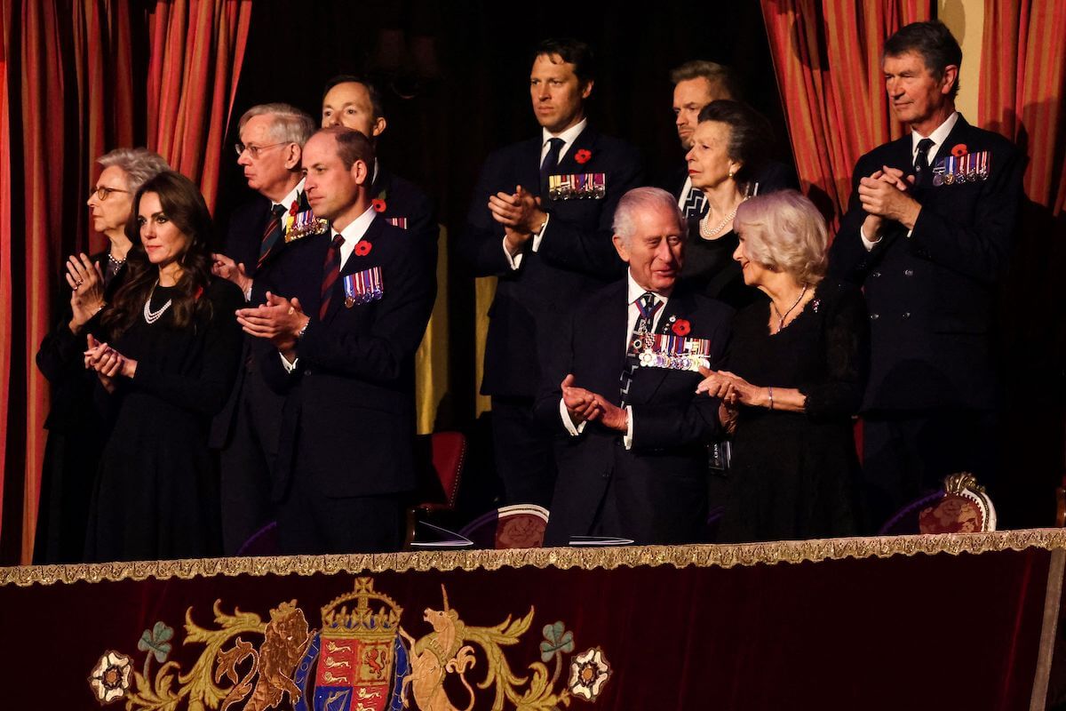 Kate Middleton, Prince William, King Charles III, Queen Camilla stand among others royals at a Remembrance Day event. 