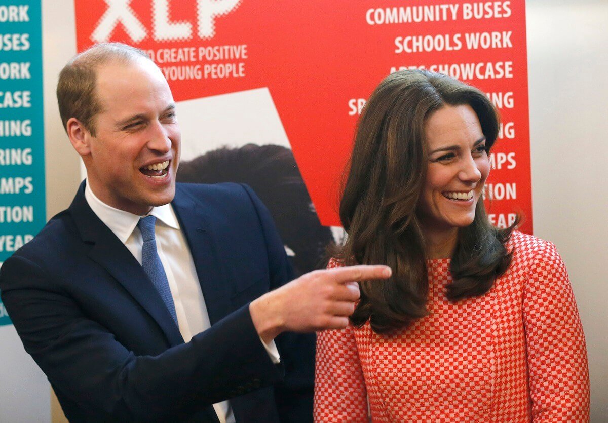 Prince William and Kate Middleton laugh as they visit the mentoring programme of the XLP project at London Wall