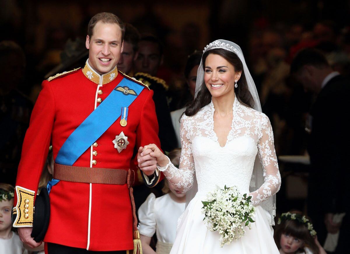 Prince William and Kate Middleton smile following their marriage at Westminster Abbey