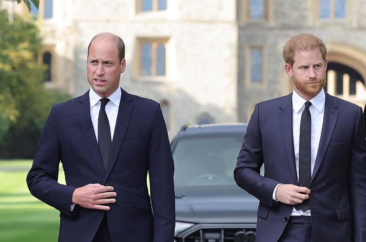 Prince William and Prince Harry, who had a blunt and damaging 2-word response to a peace meeting, on the long Walk at Windsor Castle view flowers and tributes to Queen Elizabeth