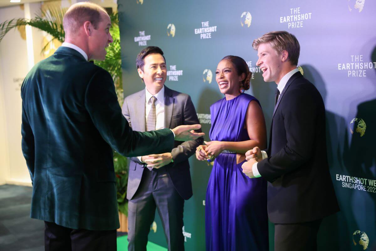 Prince William speaking with Donnie Yen, Nomzamo Mbatha, and Robert Irwin at the 2023 Earthshot Prize Awards Ceremony