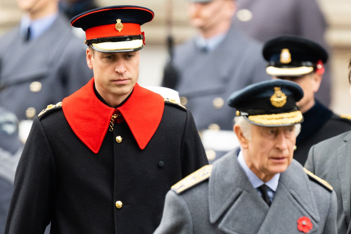 Prince William, whose body language made him the royal family's 'rock' on Remembrance Sunday 2023, walks behind King Charles