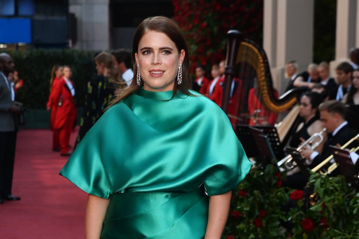 Princess Eugenie, who gets takeout delivered to Kensington Palace, on the red carpet wearing a green dress