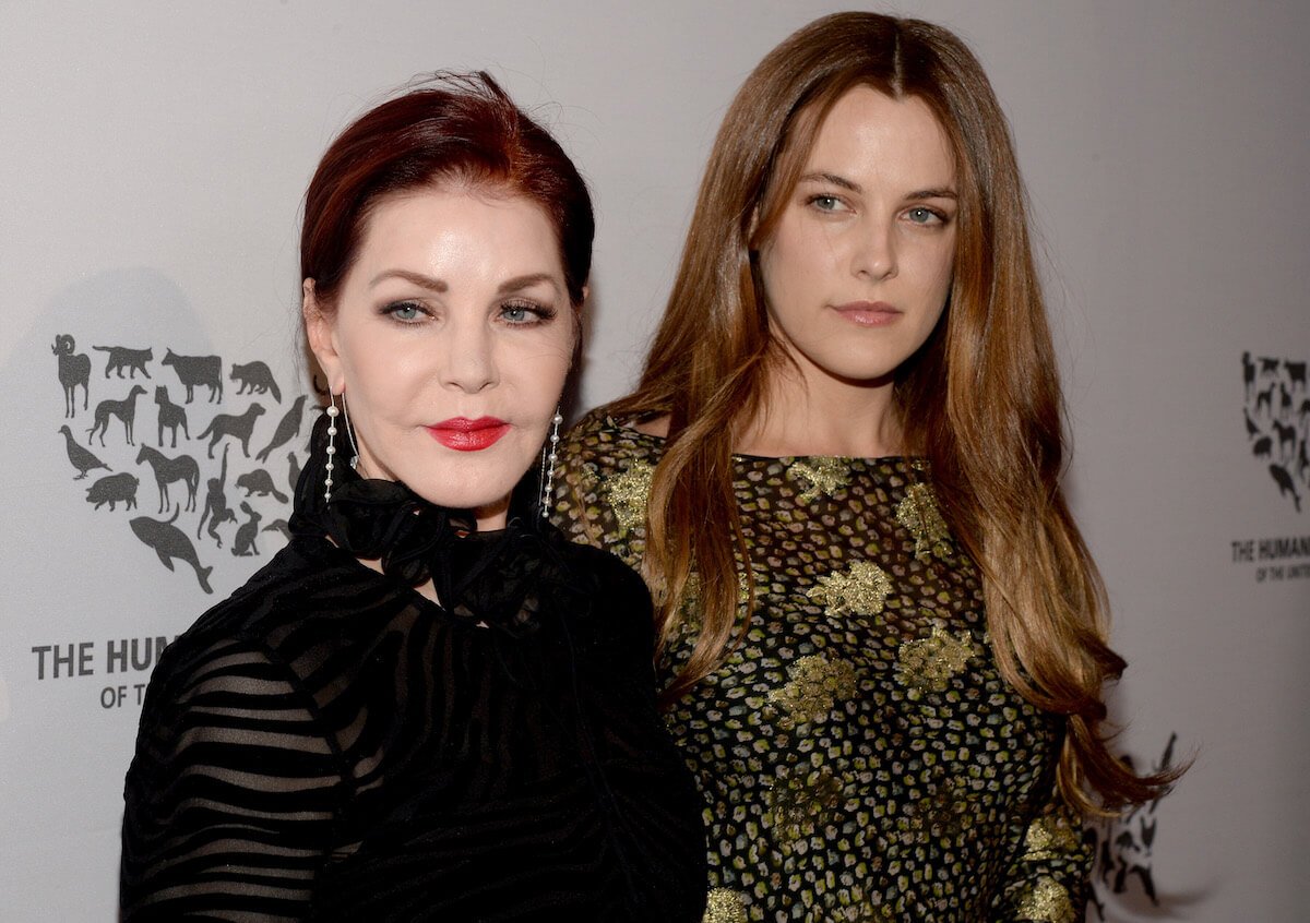 Priscilla Presley and Riley Keough standing next to each other