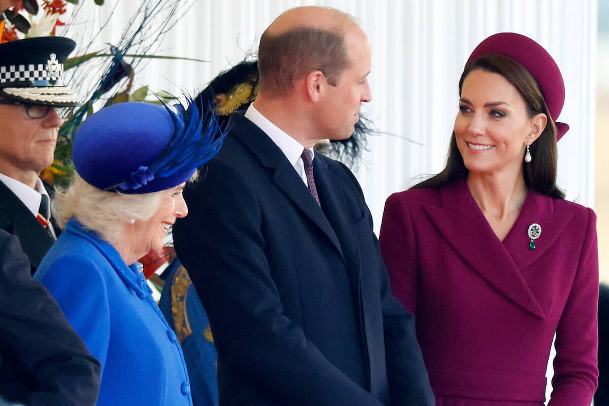 Queen Camilla, who gave Kate Middleton advice on Prince William, stands next to Prince William and Kate Middleton
