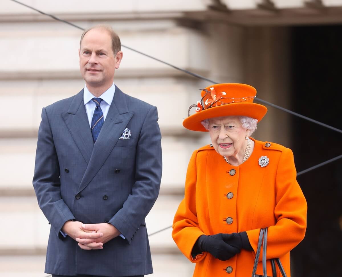 Queen Elizabeth II and Prince Edward attend the launch of The Queen's Baton Relay for the XXII Commonwealth Games at Buckingham Palace